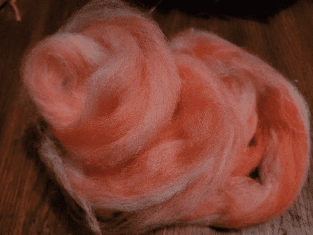 pile of homemade roving from hand cards