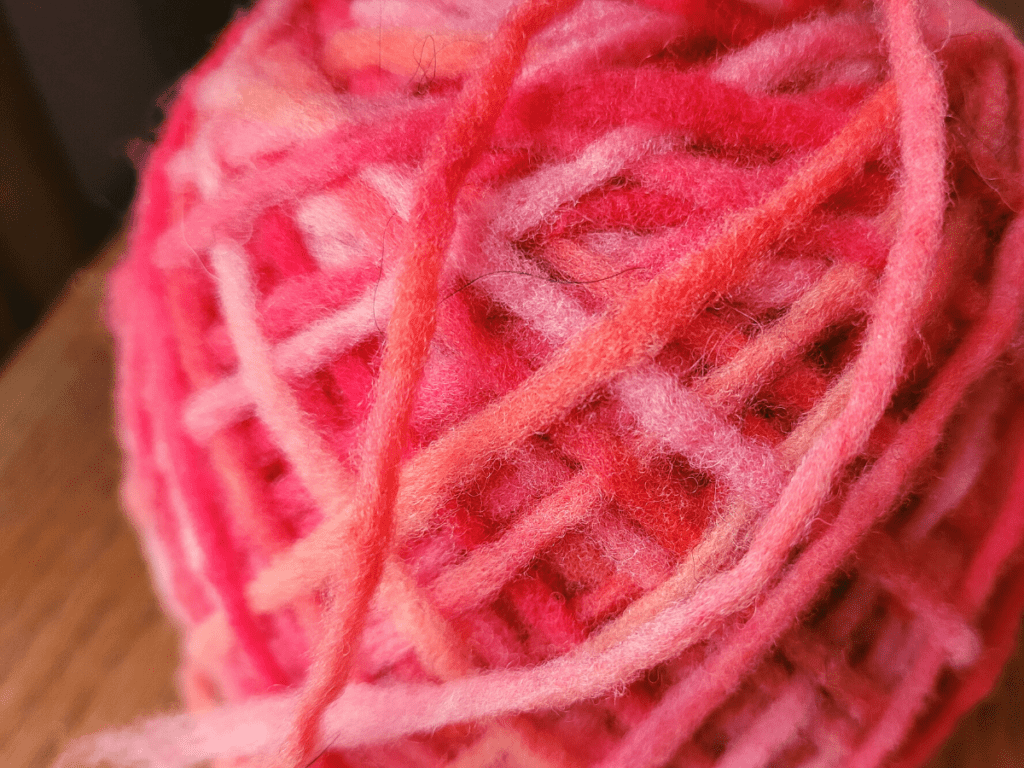 ball of pink pencil roving