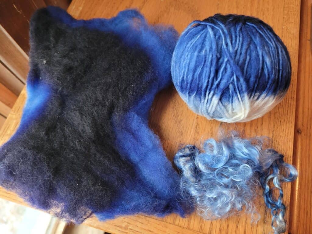 blue dyed wool, ball of yarn and kid mohair