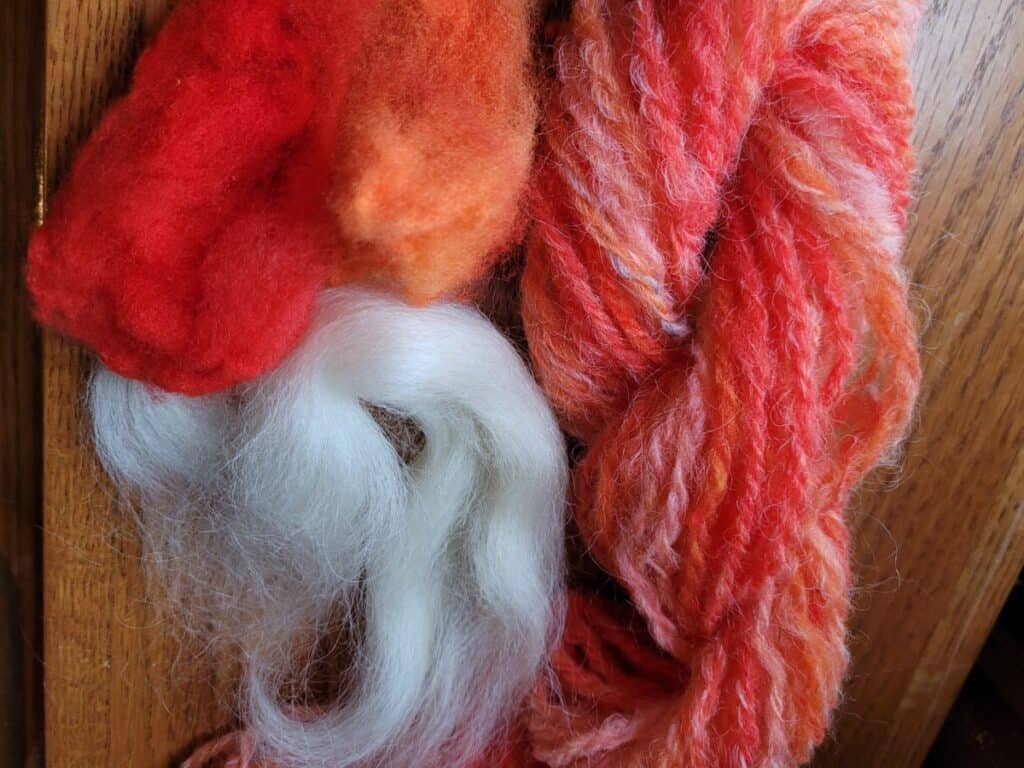 red and orange Dorset cross wool with Teeswater to make yarn